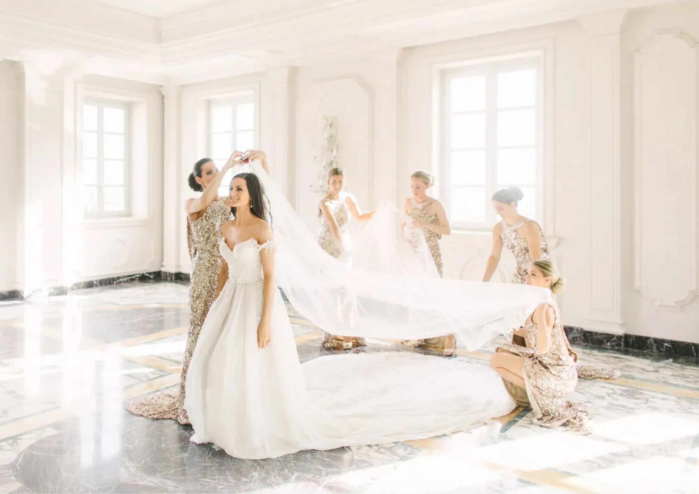 Bride getting dressed on her wedding day