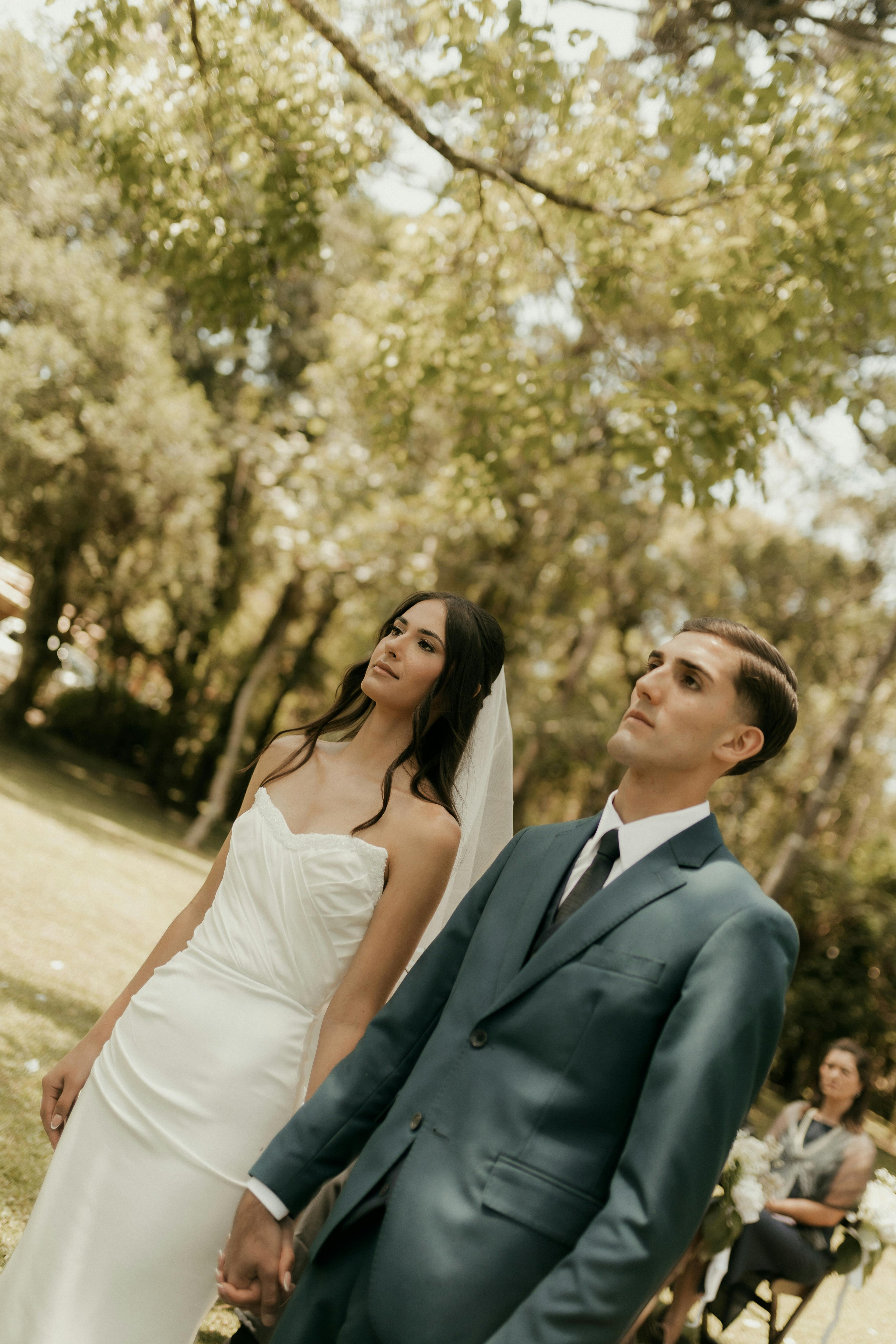 Bride and groom posing for pictures
