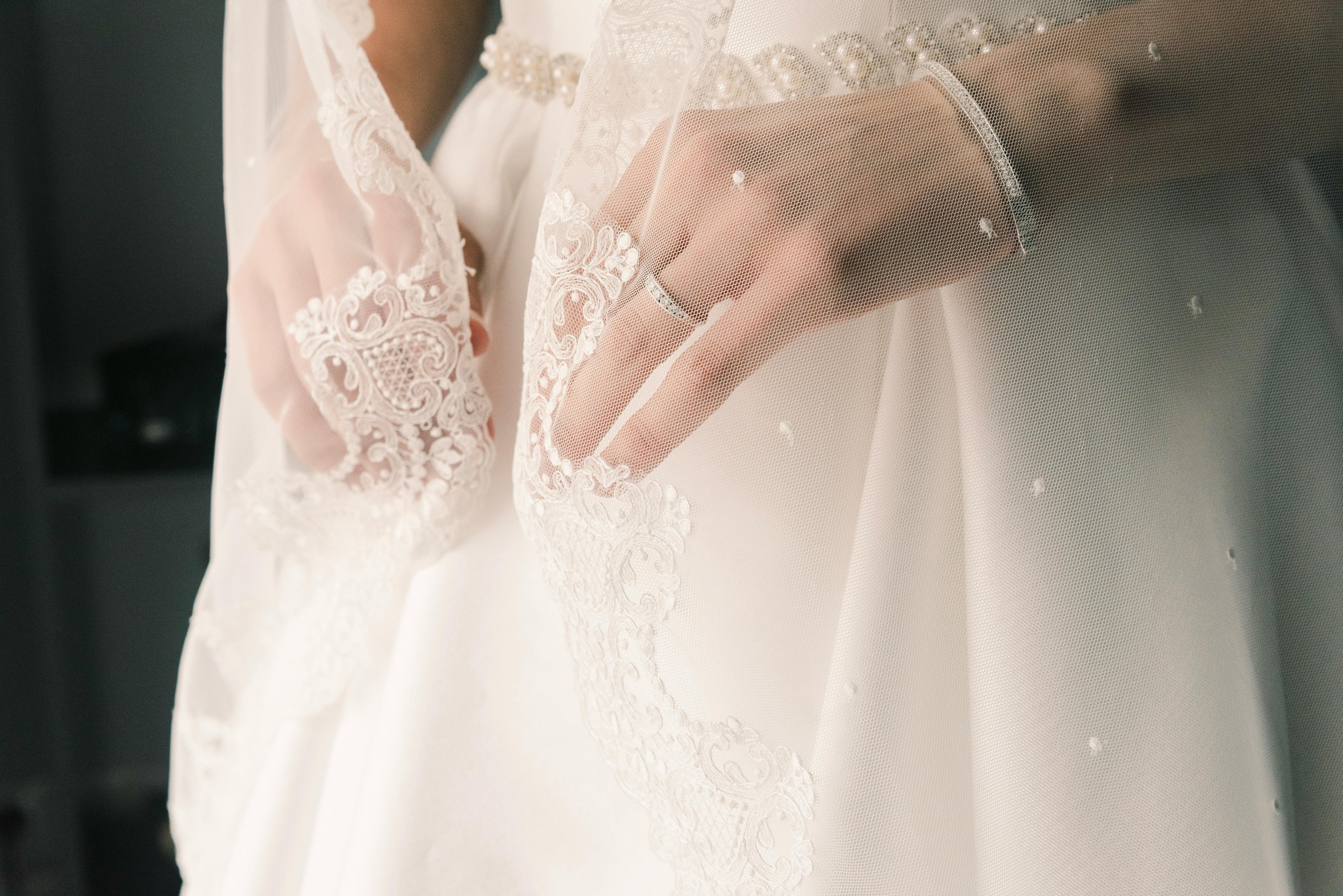 Bride wearing gloves