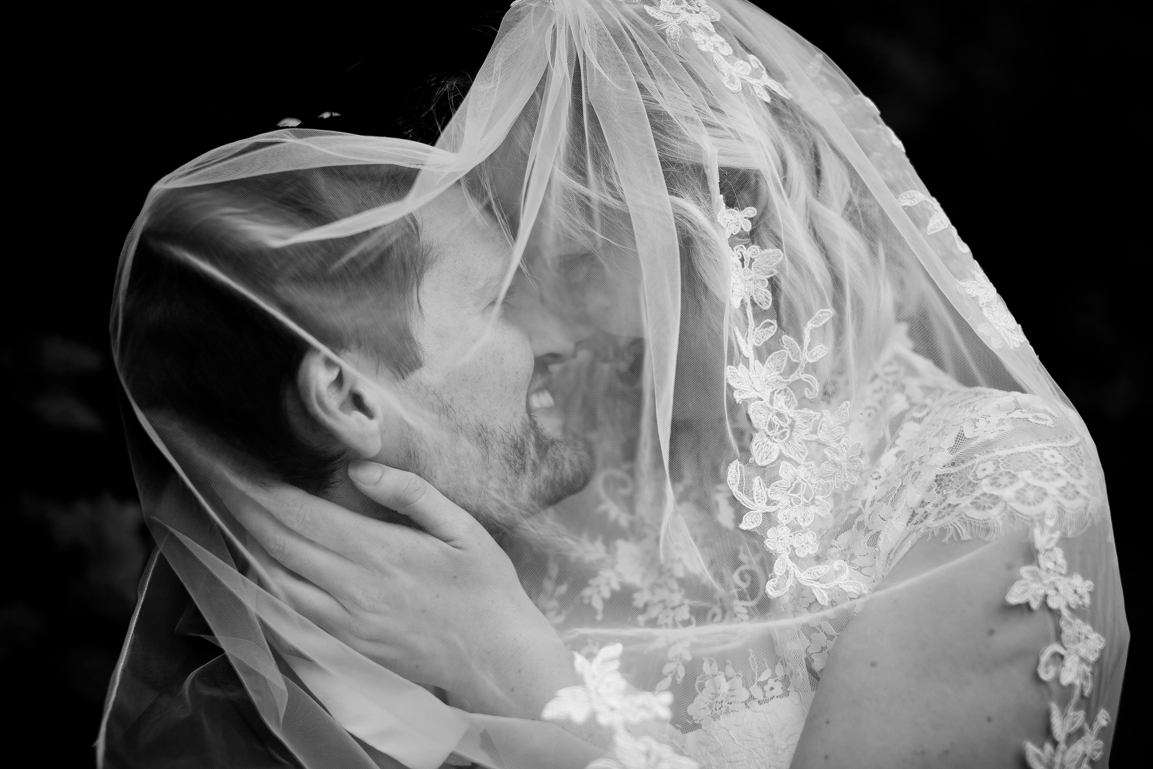 Married couple under a veil
