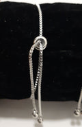 Timeless Silver Circle Drawstring Bracelet for Weddings & Events